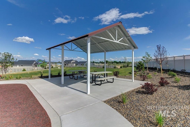 view of home's community with a patio area