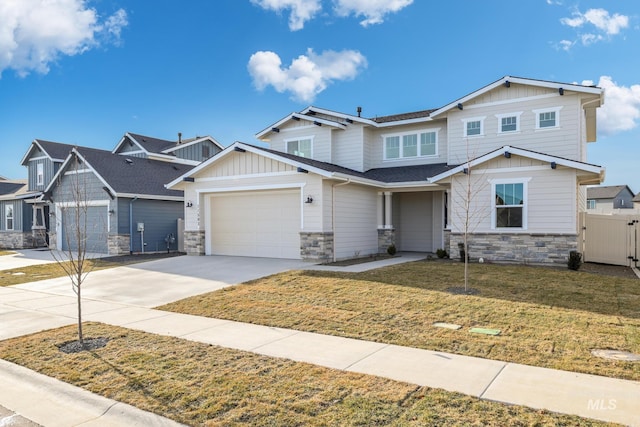 craftsman inspired home with a front yard and a garage