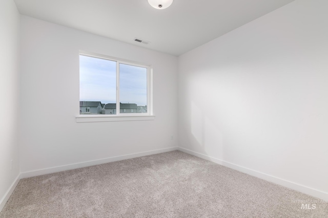 unfurnished room with carpet