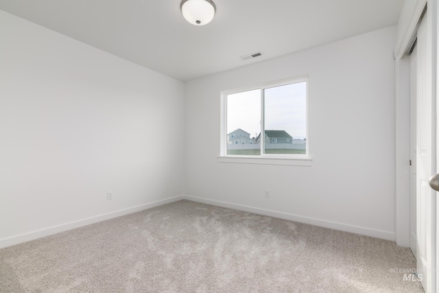 unfurnished bedroom with a closet and carpet