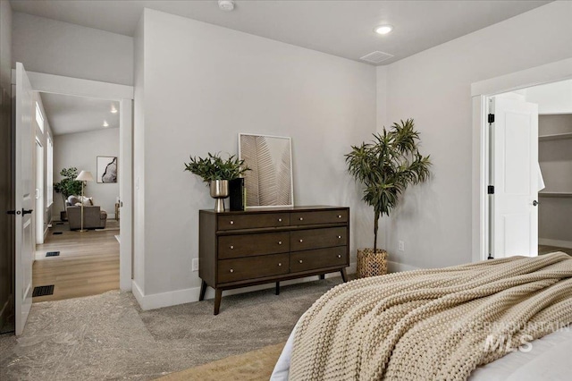 bedroom featuring recessed lighting, baseboards, and carpet flooring