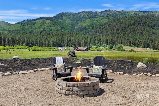 15 Alder Creek Ln, Garden Valley, ID 83622 - view of mountain backdrop featuring a heavily wooded area