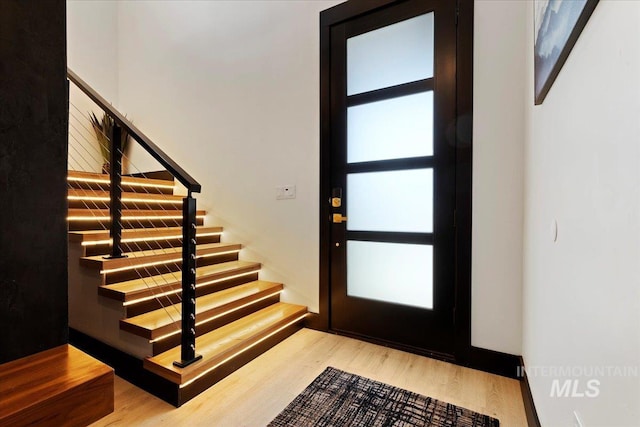 15 Alder Creek Ln, Garden Valley, ID 83622 - entryway with stairway and wood finished floors