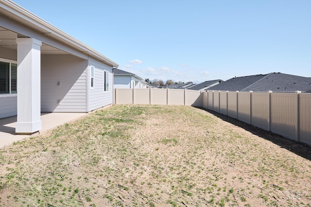 view of yard featuring a fenced backyard