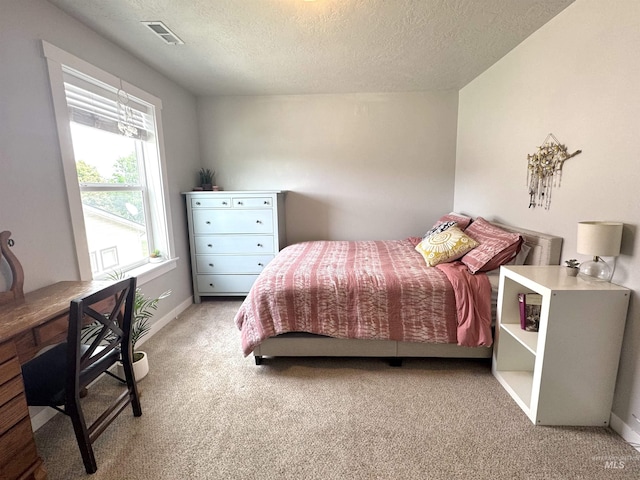 4446 S Carina Way, Meridian, ID 83642 - bedroom featuring carpet, a textured ceiling, and an office area
