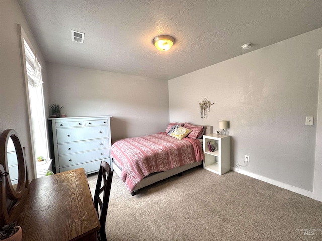 4446 S Carina Way, Meridian, ID 83642 - carpeted bedroom featuring a textured ceiling and baseboards