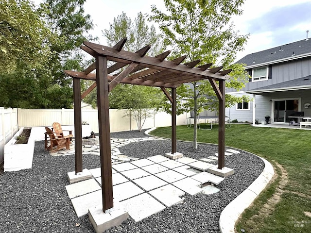 4446 S Carina Way, Meridian, ID 83642 - view of patio featuring a pergola and a trampoline