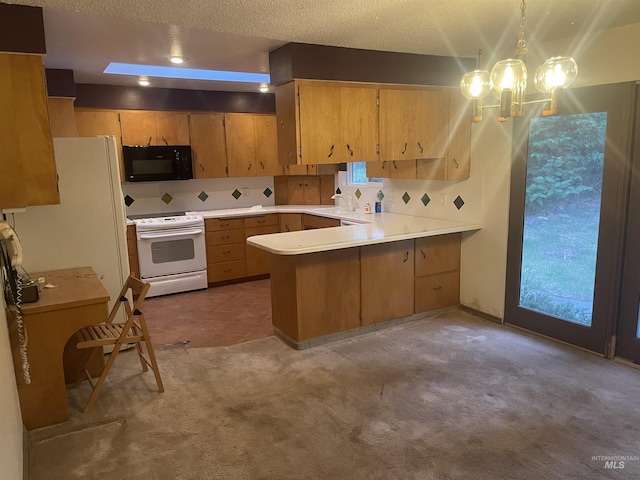 833 N Cleveland St, Moscow, ID 83843 - kitchen featuring black microwave, a peninsula, white electric range, light countertops, and a textured ceiling
