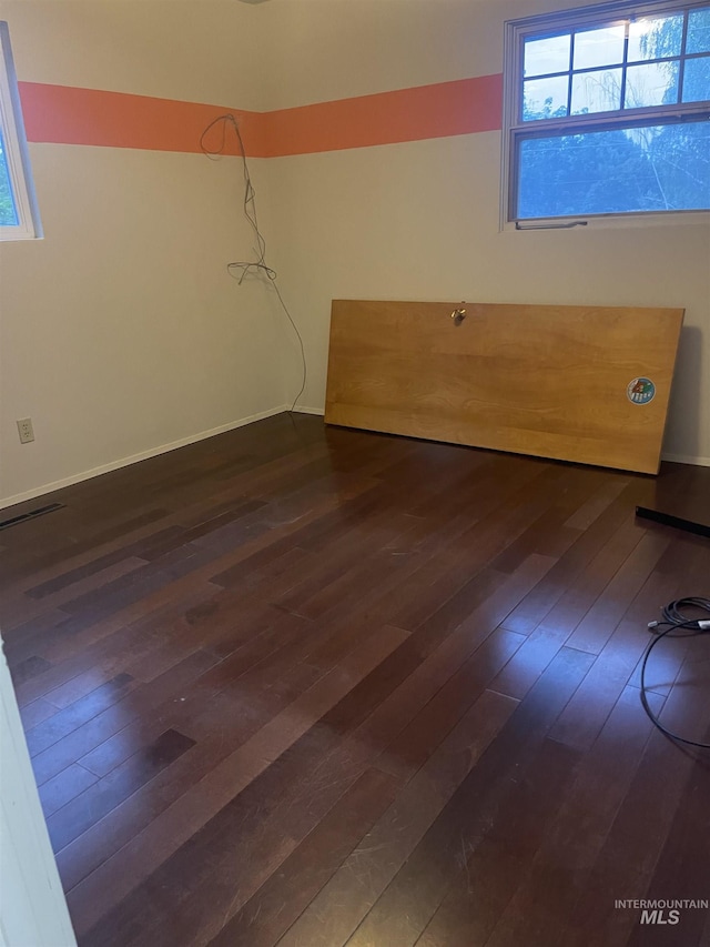833 N Cleveland St, Moscow, ID 83843 - unfurnished room with dark wood-style flooring