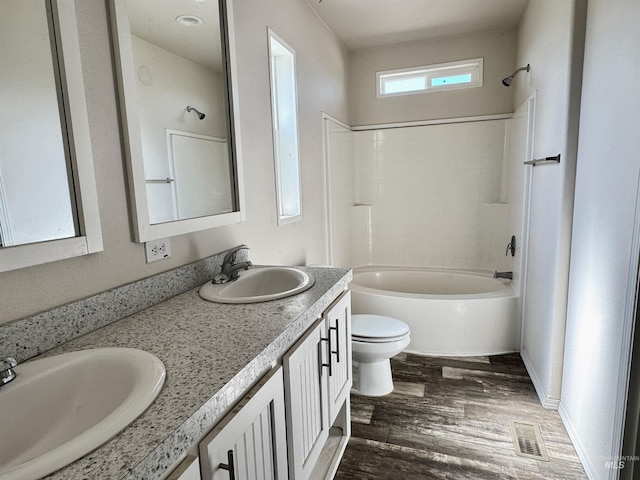 150 Sunset Dr N, Hagerman, ID 83332 - full bathroom with toilet, wood finished floors, shower / bathtub combination, and double vanity