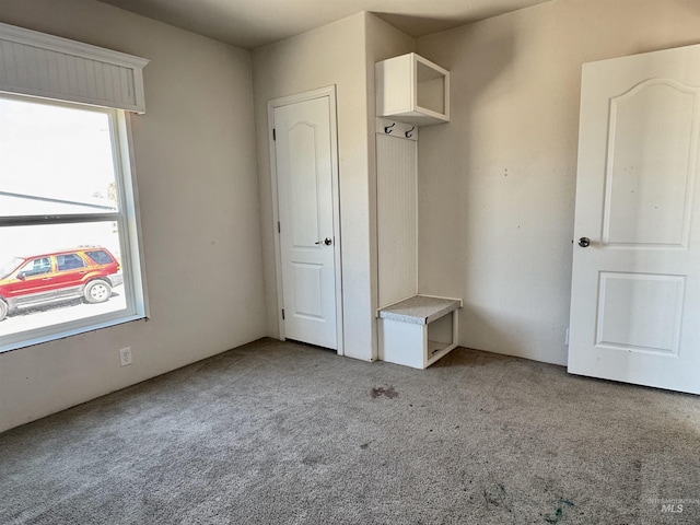 150 Sunset Dr N, Hagerman, ID 83332 - unfurnished bedroom featuring light carpet