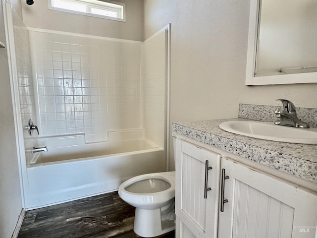 150 Sunset Dr N, Hagerman, ID 83332 - full bathroom featuring vanity, wood finished floors, shower / washtub combination, and toilet
