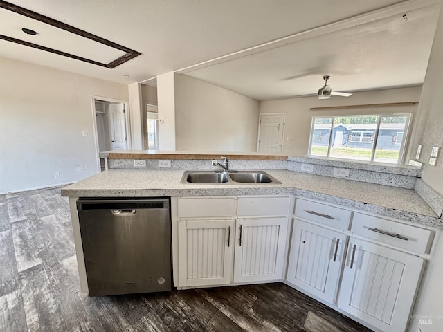 150 Sunset Dr N, Hagerman, ID 83332 - kitchen with dishwasher, a sink, dark wood-style flooring, light countertops, and white cabinetry