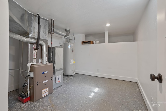 utility room featuring water heater