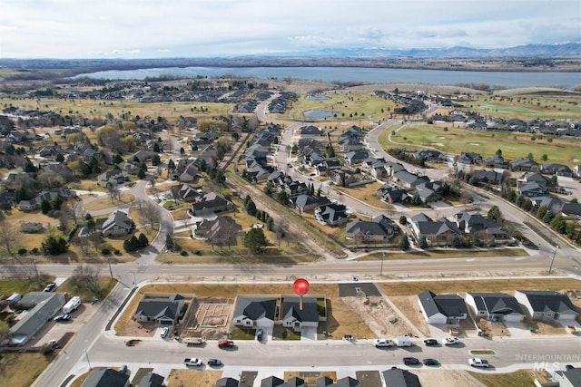 birds eye view of property featuring a residential view and a water view