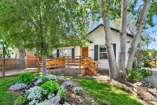 1219 N Indiana, Caldwell, ID 83605 - back of house with a deck and fence