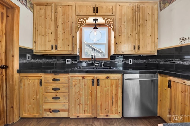 1219 N Indiana, Caldwell, ID 83605 - kitchen featuring a sink, backsplash, dishwasher, and light brown cabinets