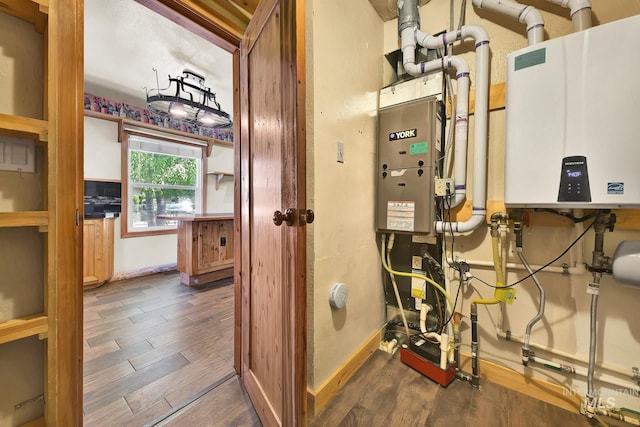 1219 N Indiana, Caldwell, ID 83605 - utility room featuring tankless water heater