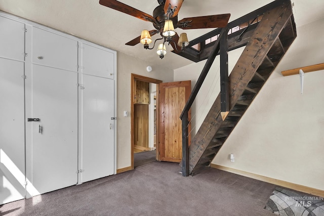 1219 N Indiana, Caldwell, ID 83605 - unfurnished bedroom with baseboards, carpet flooring, and a ceiling fan
