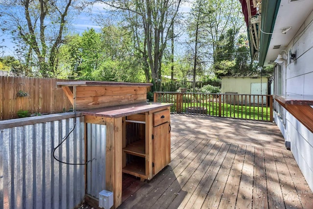 1219 N Indiana, Caldwell, ID 83605 - wooden deck with a fenced backyard