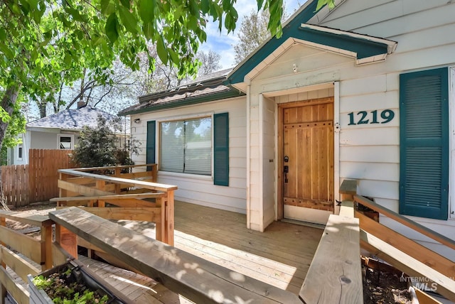 1219 N Indiana, Caldwell, ID 83605 - property entrance with fence and a wooden deck
