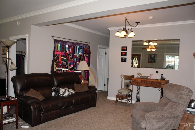 living room with a notable chandelier, ornamental molding, and carpet floors