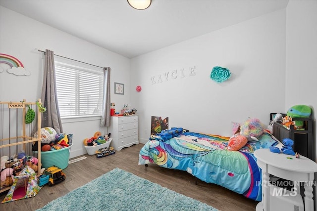 bedroom featuring hardwood / wood-style floors