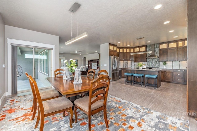 8194 S Bogus Ridge Way, Boise, ID 83716 - dining area with recessed lighting and a textured ceiling