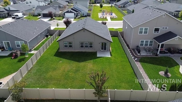 drone / aerial view with a residential view
