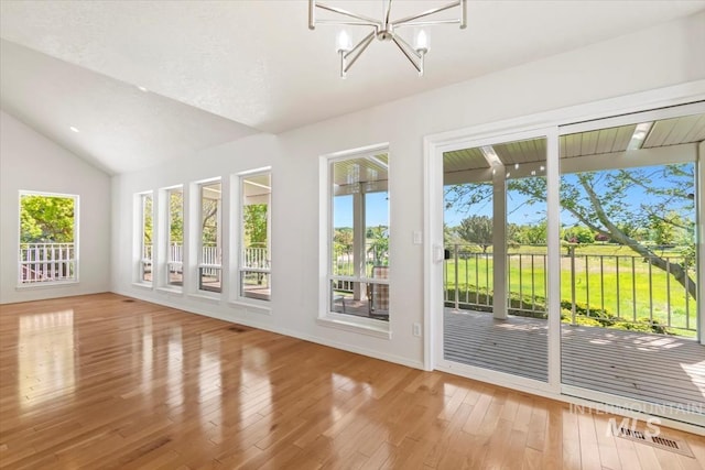 975 W Meander Ct, Eagle, ID 83616 - unfurnished sunroom featuring a chandelier and vaulted ceiling