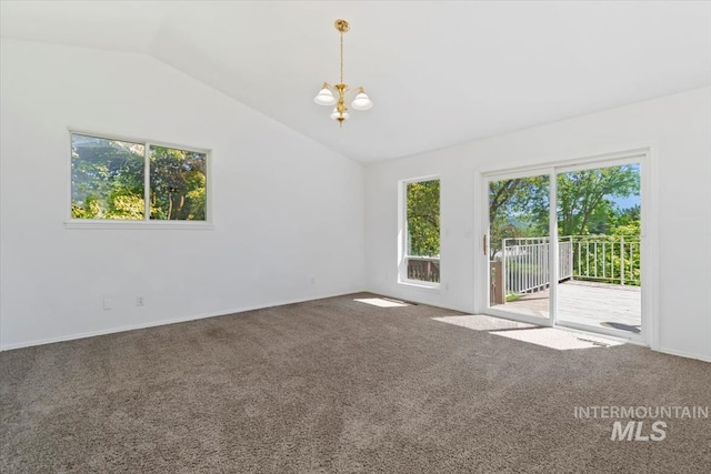 975 W Meander Ct, Eagle, ID 83616 - carpeted empty room featuring a chandelier, plenty of natural light, vaulted ceiling, and baseboards