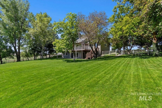 975 W Meander Ct, Eagle, ID 83616 - view of yard featuring a deck and stairs