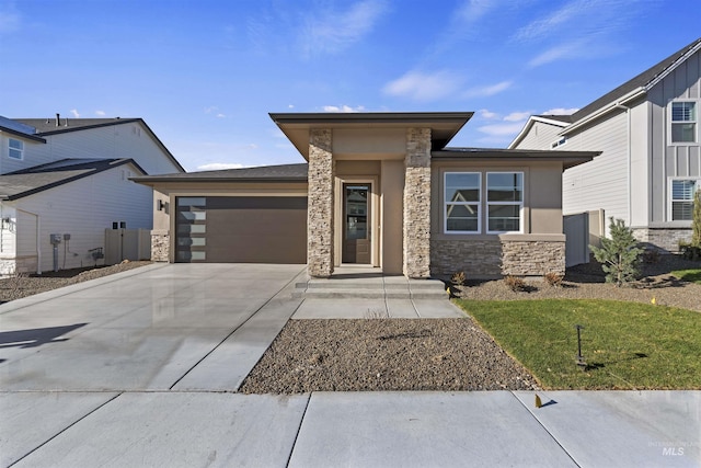 prairie-style home with a garage