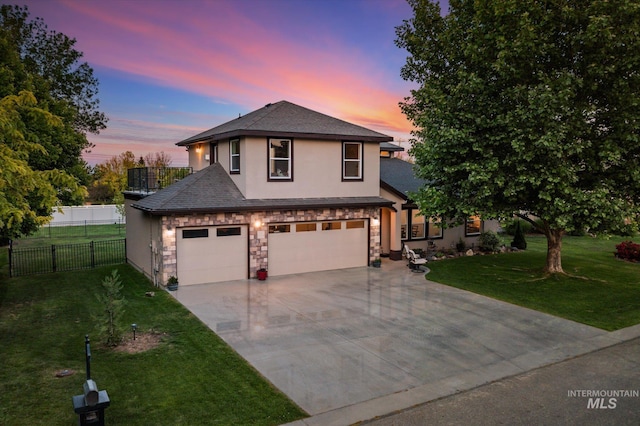 12384 S Abbott Downing Way, Nampa, ID 83686 - traditional-style house featuring stucco siding, concrete driveway, stone siding, and a shingled roof