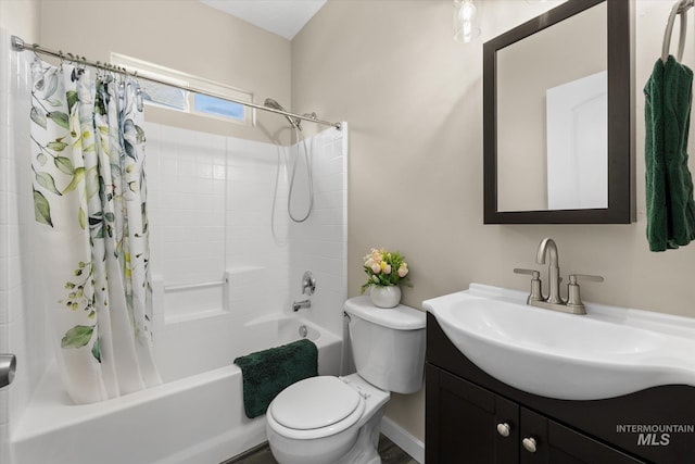 12384 S Abbott Downing Way, Nampa, ID 83686 - bathroom featuring shower / bath combo, vanity, and toilet