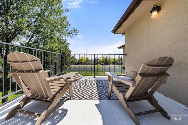 12384 S Abbott Downing Way, Nampa, ID 83686 - view of patio / terrace with a balcony
