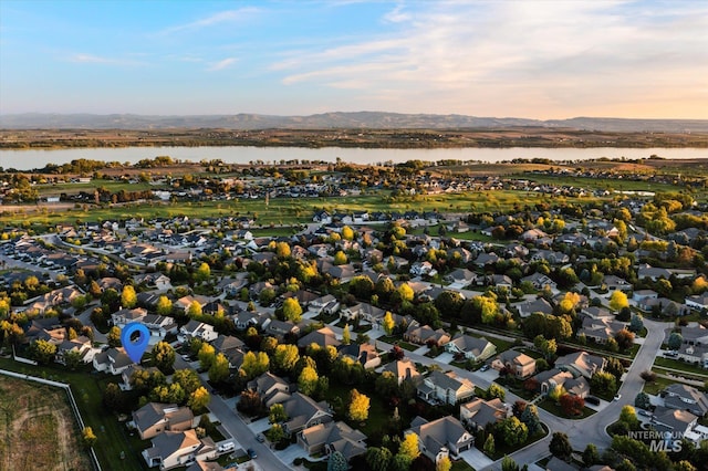 12384 S Abbott Downing Way, Nampa, ID 83686 - aerial view of property's location with nearby suburban area and a water and mountain view