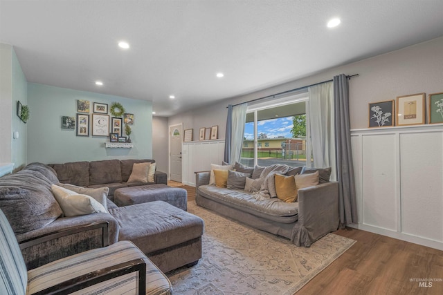 1125 Grelle Ave, Lewiston, ID 83501 - living room with wood finished floors, recessed lighting, and a wainscoted wall