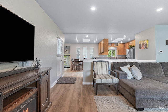 1125 Grelle Ave, Lewiston, ID 83501 - living area with light wood finished floors, baseboards, and recessed lighting