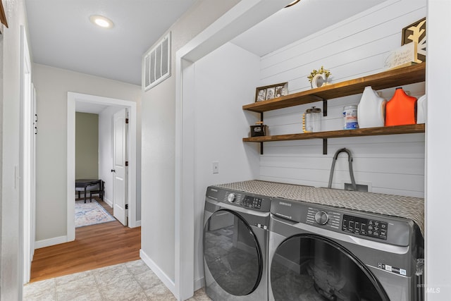 1125 Grelle Ave, Lewiston, ID 83501 - laundry area with washer and clothes dryer, baseboards, and recessed lighting