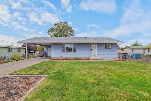 1125 Grelle Ave, Lewiston, ID 83501 - view of front of house featuring driveway, a carport, and entry steps