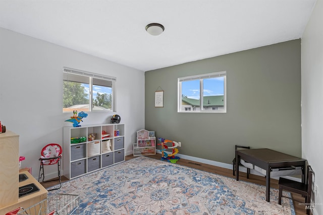 1125 Grelle Ave, Lewiston, ID 83501 - recreation room with wood finished floors and baseboards