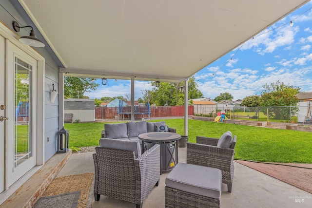 1125 Grelle Ave, Lewiston, ID 83501 - view of patio with a playground, an outdoor hangout area, and a trampoline