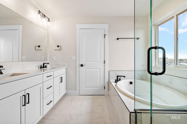 6113 N Senita Hills Ave, Meridian, ID 83646 - full bath with double vanity, marble look tiles, and a bath