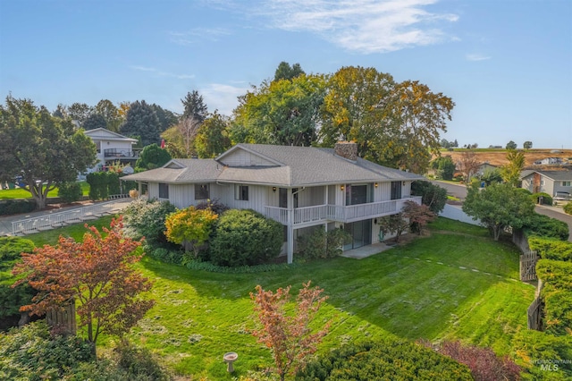 exterior space with a lawn