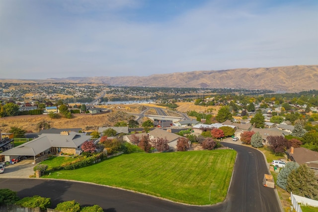 drone / aerial view featuring a mountain view