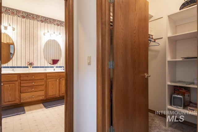 2555 E Quail Run Rd, Emmett, ID 83617 - bathroom featuring double vanity and tile patterned floors