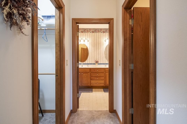 2555 E Quail Run Rd, Emmett, ID 83617 - corridor with light carpet and baseboards
