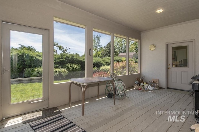 2555 E Quail Run Rd, Emmett, ID 83617 - unfurnished sunroom featuring a wooden deck and wood finished floors