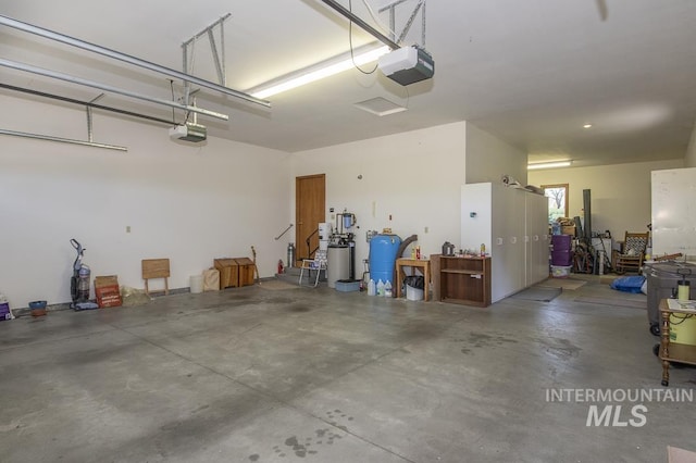 2555 E Quail Run Rd, Emmett, ID 83617 - garage featuring a garage door opener
